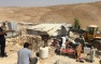 Israeli Troops Demolish Palestinian-owned Facility and Caravan