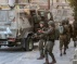 Palestinian Fighters Exchange Fire With Israeli Soldiers Invading Jenin