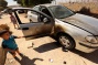 Israeli Colonizers Burn a Vehicle, Attack Homes, and Cut 150 Olive Trees in the West Bank