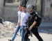 Israeli Forces Abduct Fourteen Palestinians, Injure One, in the West Bank and Gaza