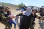 Daughters fight to save mother from arrest in Nabi Saleh
