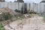 Israeli wall traps rain, sewage in Palestinian town