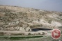 In photos: Landfill waste spills into West Bank village