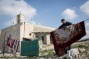 Displaced Palestinians return to village after 64 years
