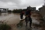 Widespread flooding in Gaza forces thousands to flee homes