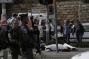 Palestinian car kills 1, injures 13 as driver shot dead