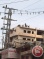 Israeli forces demolish Cola building, 20 stores in Shufat camp