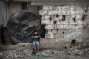 Photos: Gaza families live in rubble of their bombed homes