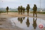 Israeli forces cross Gaza border, level lands