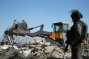 Israeli forces prepare to demolish homes of 2 Palestinian attackers