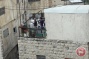 Video: Hebron settlers steal wooden furniture from Palestinian home for Lag BaOmer bonfire