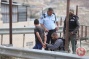Israel detains teenage son of slain shooter, extend detentions of his other 2 children