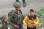 Video: Israeli forces drag 8-year-old Palestinian boy, wearing no shoes, looking for stone-throwers