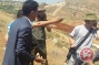 Palestinian villagers temporarily detain armed Israeli settlers
