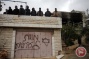 Israeli settlers torch Palestinian car, spray racist anti-Arab graffiti in East Jerusalem