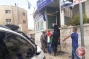 Israeli forces detain youth for wearing shirt of Palestinian flag