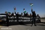 Activists shut down traffic on new West Bank 'apartheid road'