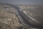 Activists shut down traffic on new West Bank 'apartheid road'