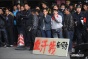 Construction Workers Protest in Front of the Tallest Building in Zhongshan City, Guangdong Province