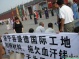 Construction Workers Petition to a "Judge" in a Historical Performance-Protest in Kaifeng City, Henan Province