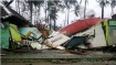 33 photos of damaged houses and uprooted trees in the town of Borogan ("devasted"), Eastern Samar