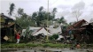 33 photos of damaged houses and uprooted trees in the town of Borogan ("devasted"), Eastern Samar