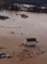 3 photos d'habitations inondées et secourues par hélicoptère près de Fréjus.
